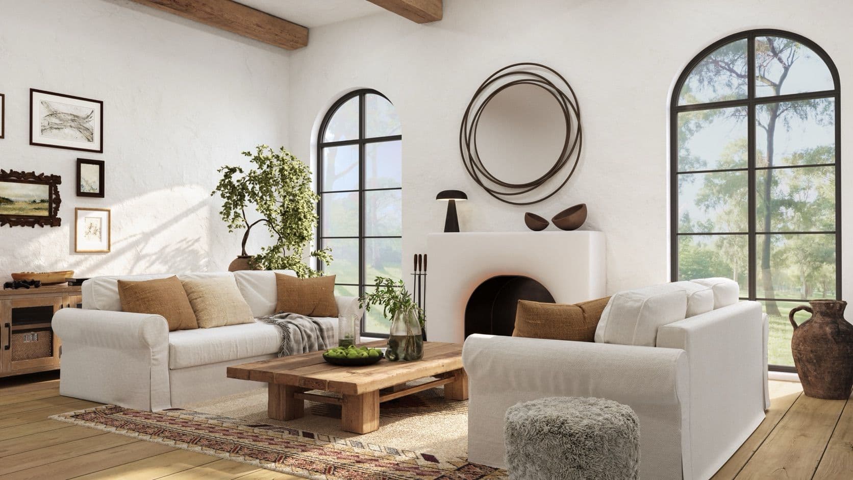 Bright, tidy living room with white sofas and arched windows
